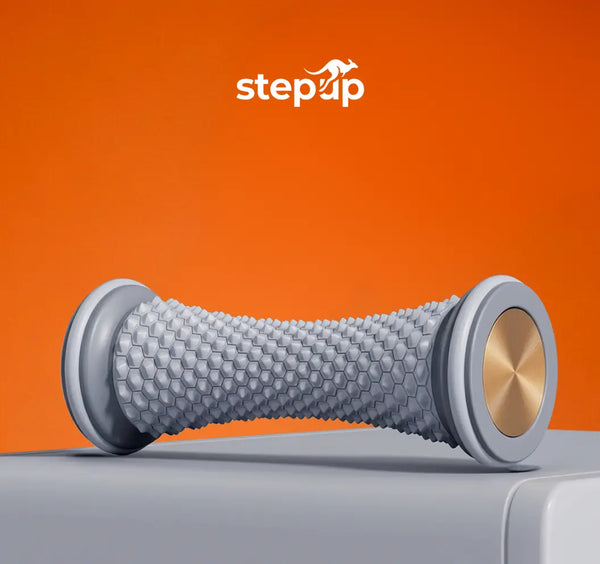 Gray Stepup Foot Massage Roller on an orange background